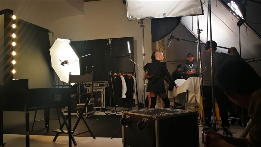 Shenzhen Camera Crew working on a studio set with lighting and grip equipment